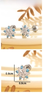 Detail view of snowflake stud earring with blue and white zircon and 0.8cm diameter