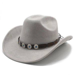 Detail of light gray suede fedora featuring leather band with turquoise metal buckles
