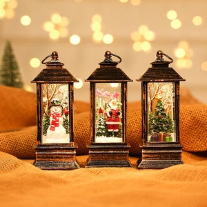 Set de 3 faroles navideños retro de bronce con figuras de Papá Noel y efecto de luz LED