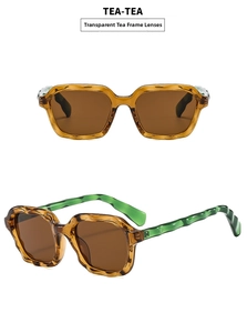 Detail view of retro square tea frame sunglasses with stylish green wavy patterned temples