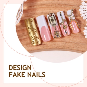 Extra long French style fake nails with gold 3D embossed rose and crystal accents