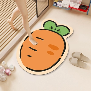 Carrot-shaped diatom mud bath mat with non-slip texture in a modern bathroom setting