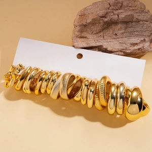 20-piece set of golden C-shaped hoop earrings with smooth and textured metal finishes