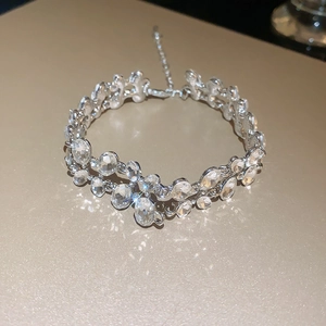 Silver-colored double-row bracelet with sparkling oval and round-cut cubic zirconia crystals