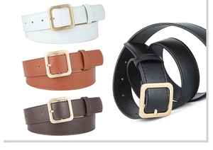 Set of four minimalist faux leather belts in white, brown, and black with golden buckles
