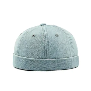 Berretto miki in denim azzurro lavato vintage con bordo arrotolato e sei pannelli