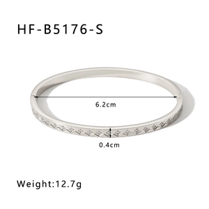 Detail view of silver rhombus bangle with zigzag texture and zircon inlay dimensions