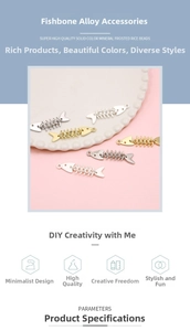 Detailed view of gold and silver movable alloy fishbone charms for DIY jewelry making