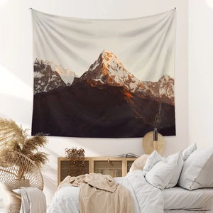 Bohemian tapestry featuring snow mountains and sunlit golden peaks for bedroom wall decor