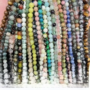 Macro detail of various natural untreated colorful gemstone beads for DIY jewelry making