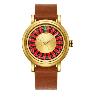 Detail of a men's watch featuring a gold case and unique roulette gambling dial design