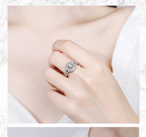 Close-up of a silver adjustable ring with double band design and square-cut zircon