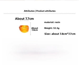 Detailed view of amber resin bangle showing dimensions 7.8x7.7cm and weight 53.5g