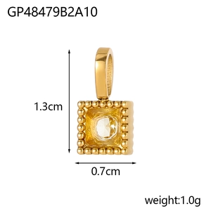 Detail view of 18K gold plated square pendant with white zircon crystal and beaded frame