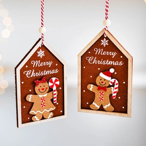 Pair of felt gingerbread house ornaments with Merry Christmas text for tree decoration
