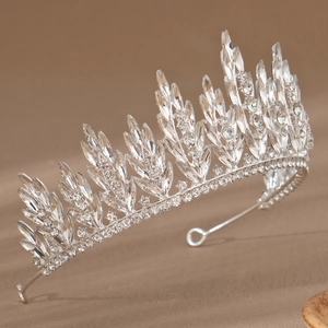 Detailed side view of silver bridal crown featuring marquise crystals and leaf patterns