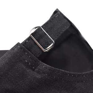 Detail of adjustable metal buckle and black twill cotton strap on high-quality baseball cap