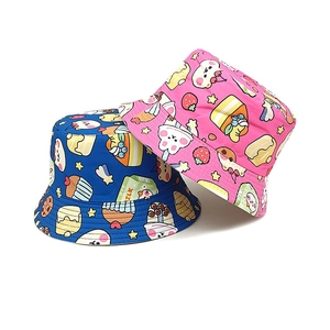 Cappelli alla pescatora reversibili per bambini con stampe di torte, blu e rosa