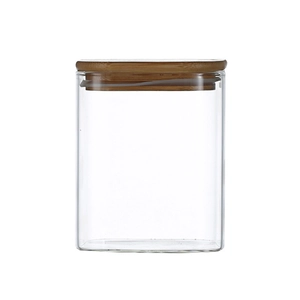 Square borosilicate glass storage jar with airtight bamboo lid on white background