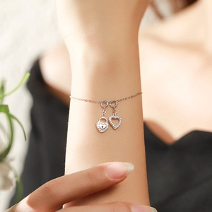 Elegant S925 sterling silver heart lock bracelet with micro-paved sparkling cubic zirconia