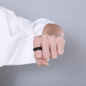 Minimalist black twisted stainless steel ring with irregular geometric design for women