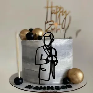 Minimalist line art acrylic cake topper featuring a man figure on a marble cake