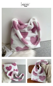 Detail showing plush white tote bag with pink heart pattern and soft faux fur texture