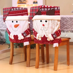 Christmas chair covers featuring snowman and reindeer designs with festive holiday patterns