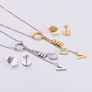 Elegant gold and silver jewelry sets featuring LOVE letter necklaces and heart stud earrings
