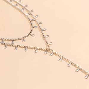 Chic multi-layered silver geometric body chain with polished teardrop pendants