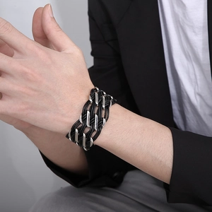 Men's double-layer black leather woven bracelet with silver stainless steel buckle on wrist