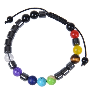 Macro detail of 8mm colorful natural stone beads with adjustable black braided cord