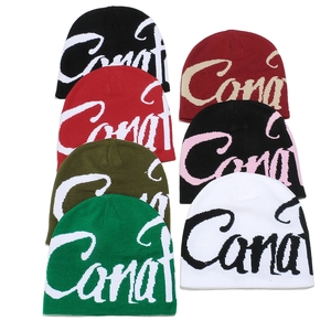 Streetwear knitted beanie hats with Canat jacquard lettering in multiple colors