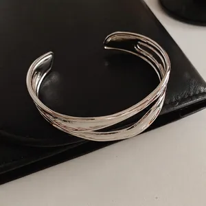 Minimalist silver irregular multi-layer open cuff bracelet with polished finish