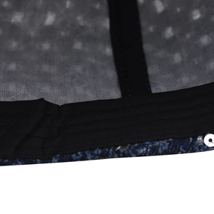 Macro detail of high-quality sequins and internal stitching on this denim baseball cap