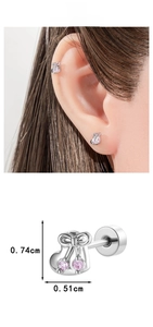 Detail shot of heart bow earrings with pink zircon showing size 0.74cm by 0.51cm