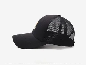 Side view of black breathable trucker hat showing mesh panels and solid curved brim