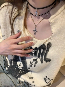 Detailed layered necklace set with leather choker and crystal cross pendants