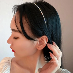Elegant sparkling rhinestone bow headband for women in silver metallic finish