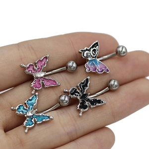 Détails de piercings de nombril papillon colorés avec paillettes et accents en émail