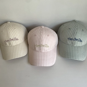 Three Gingham baseball caps in yellow, pink and grey with Nami Surf Club embroidery