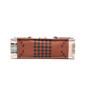 Detailed bottom view of ethnic linen tote bag with geometric diamond and triangle patterns