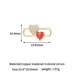 Detail showing baroque heart pendant with colored zircon and exact dimensions