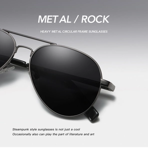 Macro view of gunmetal punk sunglasses showing nose bridge and heavy metal frame detail