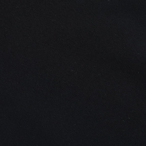 Macro view showing the fine texture of black square neck dress fabric and detailed weaving