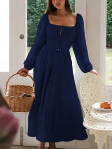 Dark blue long sleeve maxi dress with square neck and layered skirt for beach holidays