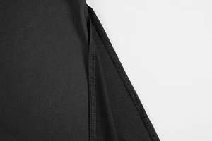 Detail shot of the tight double-needle stitching and high-quality black knit fabric seam