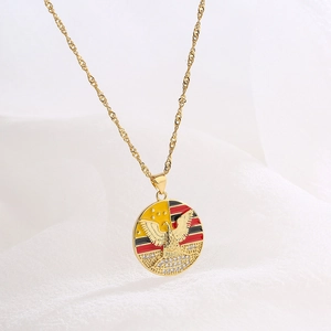 Retro 18K gold plated copper necklace with a bird emblem enamel pendant and zircon accents