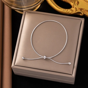 Minimalist adjustable silver snake chain bracelet with sliding bead closure for women