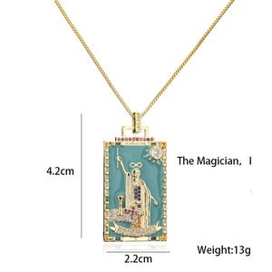 Detail of The Magician tarot card pendant with 18K gold plating and enamel inlay